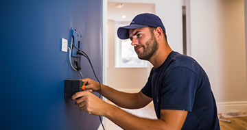What Are the Benefits of Hiring Our Electricians in Whitechapel?