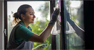 What are the Benefits of Using Our Window Cleaning Services in Livingston?