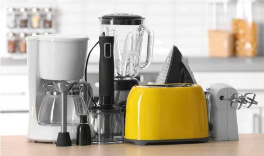 a bunch of kitchen appliances on a kitchen counter