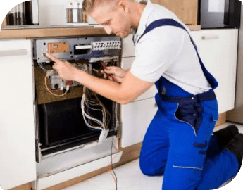 engineer fixing a dishwasher