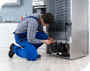 technician fixing fridge