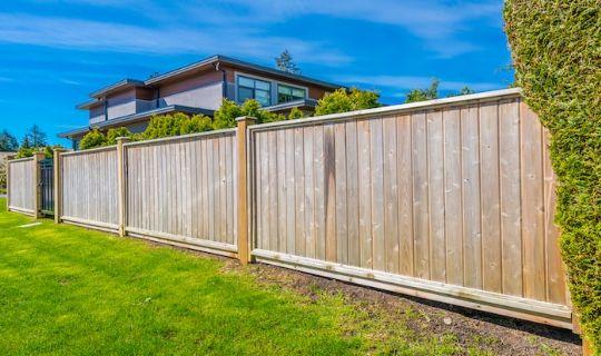 a fence with wooden posts