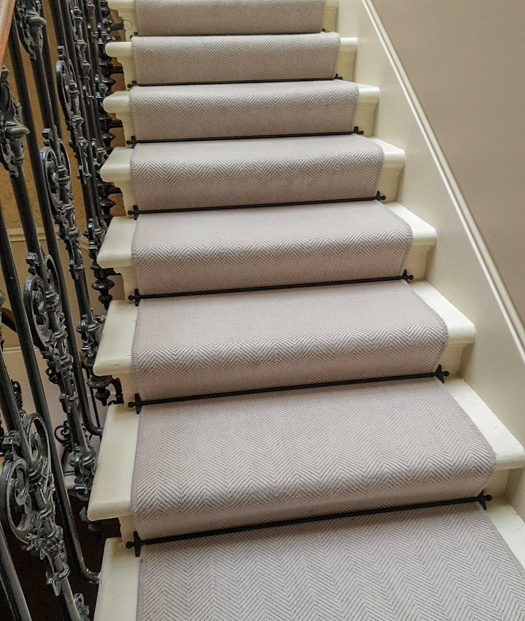 Immaculate Mercury-colored carpeted staircase, professionally cleaned and revitalized.