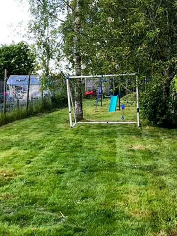 Well-maintained small lawn after professional mowing in London