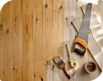 Picture of tools on wood flooring during gap filling and refinishing service.