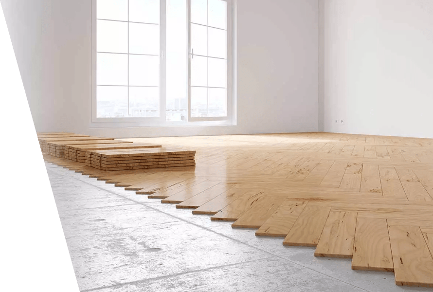 Installation of a parquet floor in a spacious room.