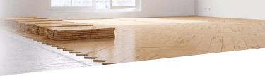 Installation of a parquet floor in a spacious room.