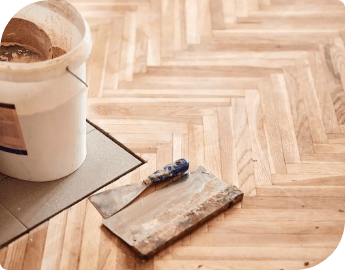 Wood floor during repair and restoration service.