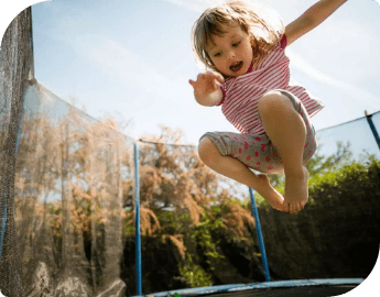 Child jumps on newly installed trampoline