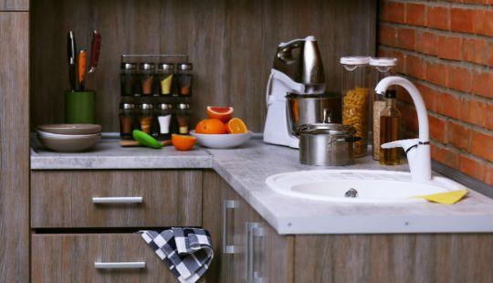 a kitchen counter with a sink