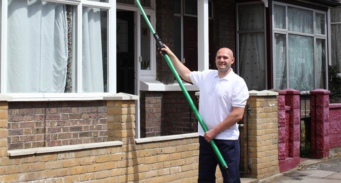 Exterior window cleaning with extended pole