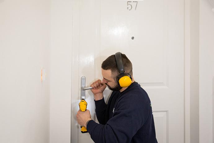 A specialist wile fixing interior door lock