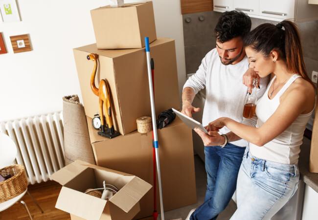 Couple checking end of tenancy cleaning prices