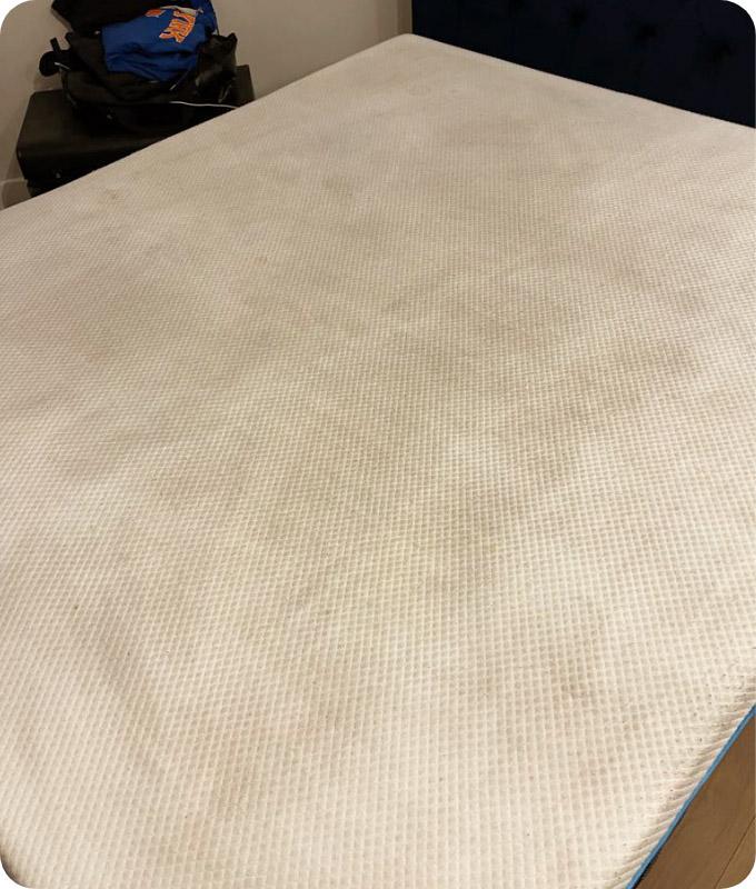 A white mattress looking perfectly cleaned, fresh and sanitised and free of any stains after our professional cleaning services.