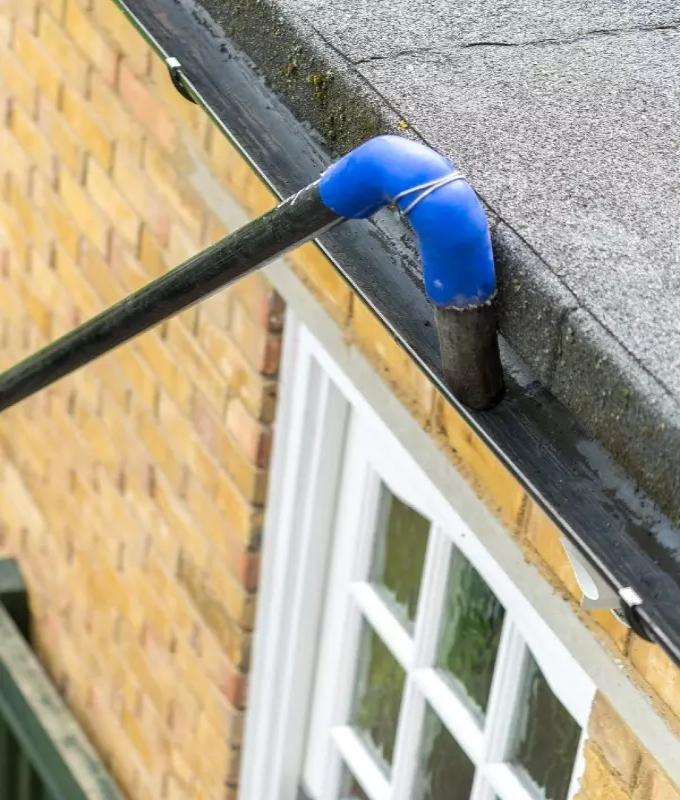 Close-up of gutter cleaning equipment used to remove dirt and debris from gutters