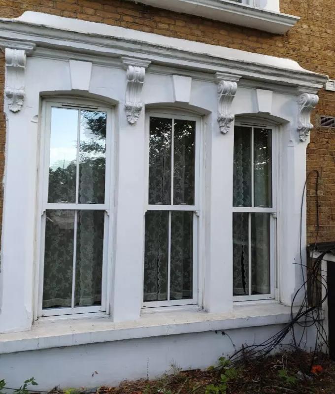 Close-up of tree windows showing how they look like after professional window cleaning service