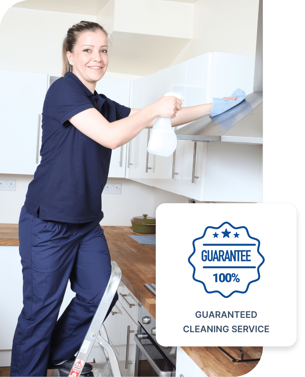 Professional cleaner on a ladder cleaning a cooker hood