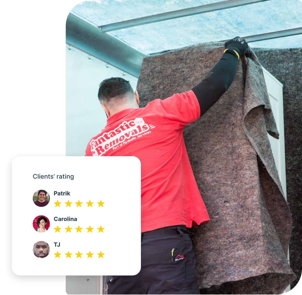 The image shows a Fantastic Services removals specialist who is covering a piece of furniture with a protective sheet to secure it in a truck.
