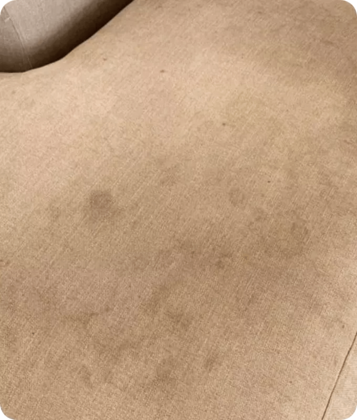 Close-up of upholstery with stains on it