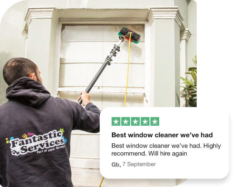 Window cleaning professional in action