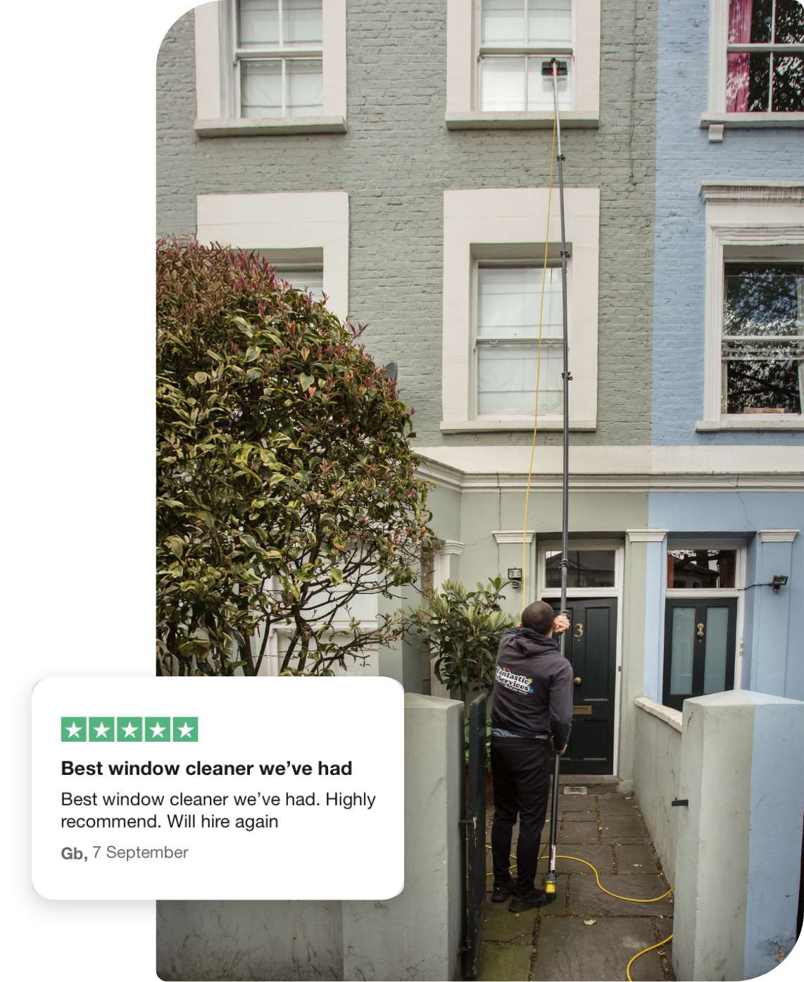 Window cleaning professional in action