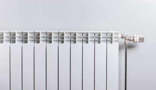 a radiator next to a wall