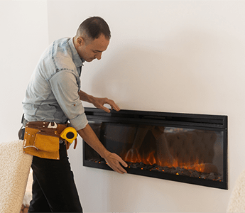 Gas fire installer while working in a London property